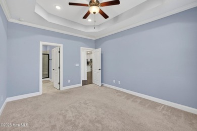 This beautifully maintained residence is set within the popular on Magnolia Greens Golf Plantation in North Carolina - for sale on GolfHomes.com, golf home, golf lot