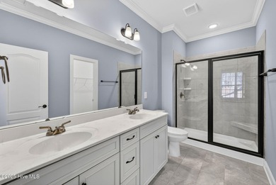 This beautifully maintained residence is set within the popular on Magnolia Greens Golf Plantation in North Carolina - for sale on GolfHomes.com, golf home, golf lot