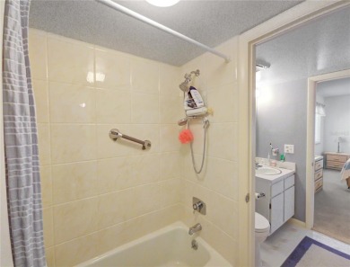 Charming 2nd Floor Furnished Condo in Live Oak Village - 55+ on Country Club At Silver Springs Shores in Florida - for sale on GolfHomes.com, golf home, golf lot