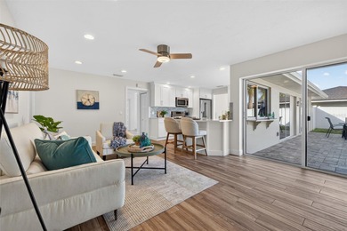 Nestled in the desirable Tanglewood neighborhood, this on Mangrove Bay Golf Course in Florida - for sale on GolfHomes.com, golf home, golf lot