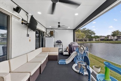 Spacious almost 2200 sq ft 3 bedroom 2.5 bath lakefront town on Jacaranda Golf Club in Florida - for sale on GolfHomes.com, golf home, golf lot