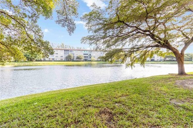 Experience affordable luxury in this beautifully renovated on Wynmoor Golf Course in Florida - for sale on GolfHomes.com, golf home, golf lot