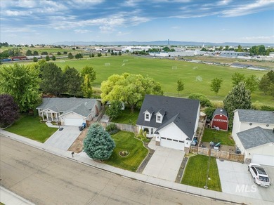 Welcome home to a truly special two-story farmhouse with on Centennial Golf Course in Idaho - for sale on GolfHomes.com, golf home, golf lot