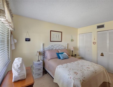 Charming 2nd Floor Furnished Condo in Live Oak Village - 55+ on Country Club At Silver Springs Shores in Florida - for sale on GolfHomes.com, golf home, golf lot