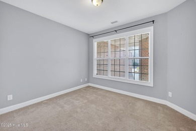 This beautifully maintained residence is set within the popular on Magnolia Greens Golf Plantation in North Carolina - for sale on GolfHomes.com, golf home, golf lot