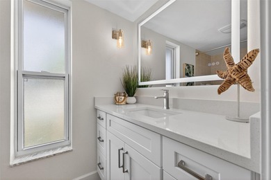 Nestled in the desirable Tanglewood neighborhood, this on Mangrove Bay Golf Course in Florida - for sale on GolfHomes.com, golf home, golf lot