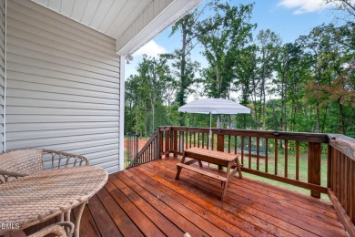 This better than new custom built 2021 home offers an open floor on River Golf and Country Club at Lake Royale in North Carolina - for sale on GolfHomes.com, golf home, golf lot