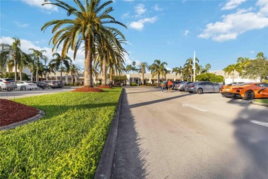 Experience affordable luxury in this beautifully renovated on Wynmoor Golf Course in Florida - for sale on GolfHomes.com, golf home, golf lot