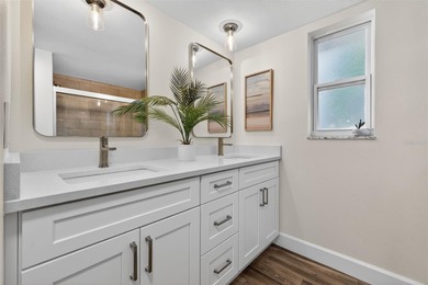 Nestled in the desirable Tanglewood neighborhood, this on Mangrove Bay Golf Course in Florida - for sale on GolfHomes.com, golf home, golf lot