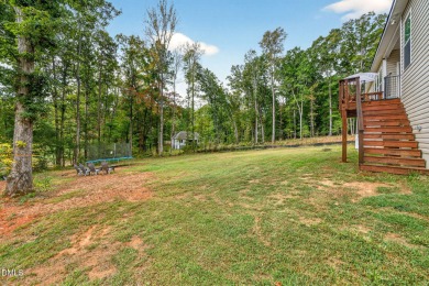 This better than new custom built 2021 home offers an open floor on River Golf and Country Club at Lake Royale in North Carolina - for sale on GolfHomes.com, golf home, golf lot