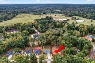 This better than new custom built 2021 home offers an open floor on River Golf and Country Club at Lake Royale in North Carolina - for sale on GolfHomes.com, golf home, golf lot