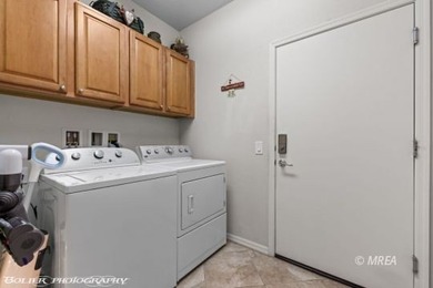 Wake to glorious sunrises in this immaculate east-facing home on Conestoga Golf Club in Nevada - for sale on GolfHomes.com, golf home, golf lot