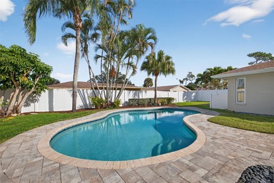 Nestled in the desirable Tanglewood neighborhood, this on Mangrove Bay Golf Course in Florida - for sale on GolfHomes.com, golf home, golf lot