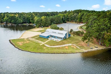This better than new custom built 2021 home offers an open floor on River Golf and Country Club at Lake Royale in North Carolina - for sale on GolfHomes.com, golf home, golf lot