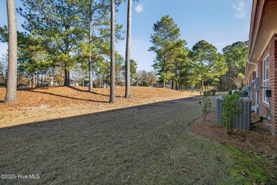This beautifully maintained residence is set within the popular on Magnolia Greens Golf Plantation in North Carolina - for sale on GolfHomes.com, golf home, golf lot
