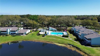 Charming 2nd Floor Furnished Condo in Live Oak Village - 55+ on Country Club At Silver Springs Shores in Florida - for sale on GolfHomes.com, golf home, golf lot