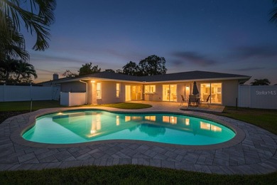 Nestled in the desirable Tanglewood neighborhood, this on Mangrove Bay Golf Course in Florida - for sale on GolfHomes.com, golf home, golf lot