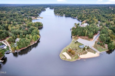 This better than new custom built 2021 home offers an open floor on River Golf and Country Club at Lake Royale in North Carolina - for sale on GolfHomes.com, golf home, golf lot