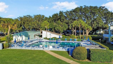 Charming 2nd Floor Furnished Condo in Live Oak Village - 55+ on Country Club At Silver Springs Shores in Florida - for sale on GolfHomes.com, golf home, golf lot