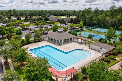 This beautifully maintained residence is set within the popular on Magnolia Greens Golf Plantation in North Carolina - for sale on GolfHomes.com, golf home, golf lot