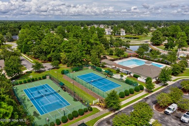 This beautifully maintained residence is set within the popular on Magnolia Greens Golf Plantation in North Carolina - for sale on GolfHomes.com, golf home, golf lot