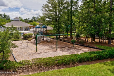 This beautifully maintained residence is set within the popular on Magnolia Greens Golf Plantation in North Carolina - for sale on GolfHomes.com, golf home, golf lot