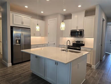 WATERFRONT HOME! Like New MAGARI MODEL HOME, including upgraded on Stonegate Golf Club in Florida - for sale on GolfHomes.com, golf home, golf lot