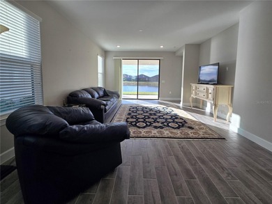 WATERFRONT HOME! Like New MAGARI MODEL HOME, including upgraded on Stonegate Golf Club in Florida - for sale on GolfHomes.com, golf home, golf lot