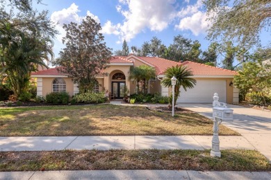 Welcome to this light-filled 3-bedroom, 3-bath home with an on University Park Country Club in Florida - for sale on GolfHomes.com, golf home, golf lot