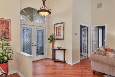 Welcome to this light-filled 3-bedroom, 3-bath home with an on University Park Country Club in Florida - for sale on GolfHomes.com, golf home, golf lot