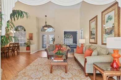 Welcome to this light-filled 3-bedroom, 3-bath home with an on University Park Country Club in Florida - for sale on GolfHomes.com, golf home, golf lot