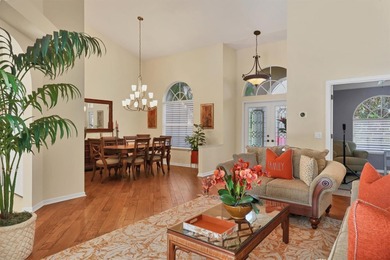 Welcome to this light-filled 3-bedroom, 3-bath home with an on University Park Country Club in Florida - for sale on GolfHomes.com, golf home, golf lot