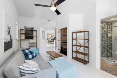 This elegant Spanish home filled with natural light, is situated on Granada Golf Club in Florida - for sale on GolfHomes.com, golf home, golf lot