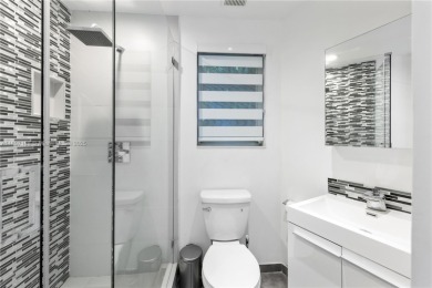 This elegant Spanish home filled with natural light, is situated on Granada Golf Club in Florida - for sale on GolfHomes.com, golf home, golf lot