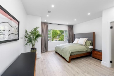 This elegant Spanish home filled with natural light, is situated on Granada Golf Club in Florida - for sale on GolfHomes.com, golf home, golf lot