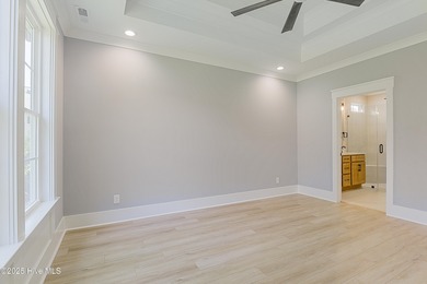 Looking for a brand-new home that showcases quality on Brunswick Plantation and Golf Resorts in North Carolina - for sale on GolfHomes.com, golf home, golf lot