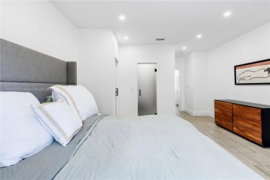 This elegant Spanish home filled with natural light, is situated on Granada Golf Club in Florida - for sale on GolfHomes.com, golf home, golf lot