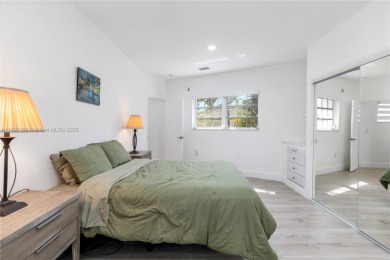 This elegant Spanish home filled with natural light, is situated on Granada Golf Club in Florida - for sale on GolfHomes.com, golf home, golf lot
