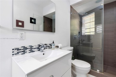 This elegant Spanish home filled with natural light, is situated on Granada Golf Club in Florida - for sale on GolfHomes.com, golf home, golf lot