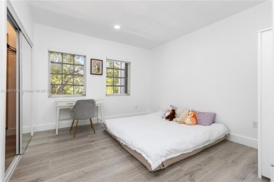 This elegant Spanish home filled with natural light, is situated on Granada Golf Club in Florida - for sale on GolfHomes.com, golf home, golf lot