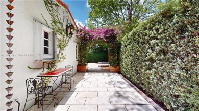 This elegant Spanish home filled with natural light, is situated on Granada Golf Club in Florida - for sale on GolfHomes.com, golf home, golf lot