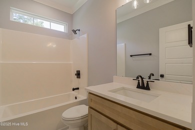 Looking for a brand-new home that showcases quality on Brunswick Plantation and Golf Resorts in North Carolina - for sale on GolfHomes.com, golf home, golf lot
