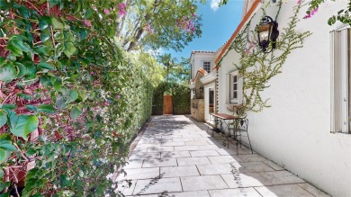 This elegant Spanish home filled with natural light, is situated on Granada Golf Club in Florida - for sale on GolfHomes.com, golf home, golf lot