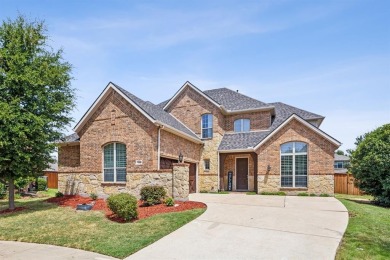 Immerse in the charm of this two-story Lantana Golf Course on Lantana Golf Club in Texas - for sale on GolfHomes.com, golf home, golf lot