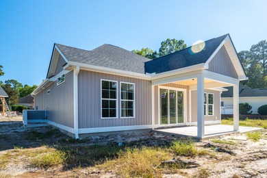 Looking for a brand-new home that showcases quality on Brunswick Plantation and Golf Resorts in North Carolina - for sale on GolfHomes.com, golf home, golf lot