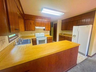 Nestled along the coveted North Golf Course in Cherokee Village on Cherokee Village North Course in Arkansas - for sale on GolfHomes.com, golf home, golf lot