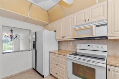 LUXURIOUS ISLAND STYLE 2BR/2BA with 17th hole PGA course green & on Hollybrook Golf and Tennis Club  in Florida - for sale on GolfHomes.com, golf home, golf lot