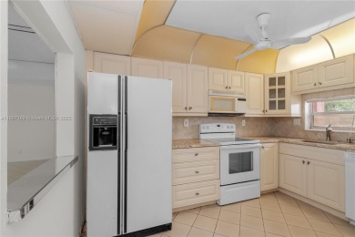 LUXURIOUS ISLAND STYLE 2BR/2BA with 17th hole PGA course green & on Hollybrook Golf and Tennis Club  in Florida - for sale on GolfHomes.com, golf home, golf lot