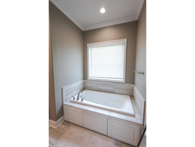 Built in 2018, this stunning custom home sits right on the #5 on Mystic Creek Golf Club in Arkansas - for sale on GolfHomes.com, golf home, golf lot