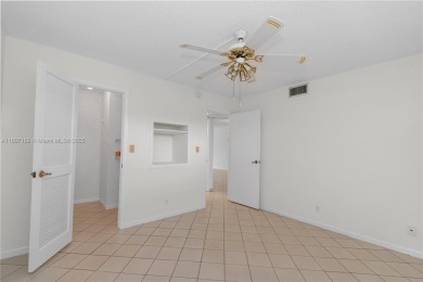 LUXURIOUS ISLAND STYLE 2BR/2BA with 17th hole PGA course green & on Hollybrook Golf and Tennis Club  in Florida - for sale on GolfHomes.com, golf home, golf lot